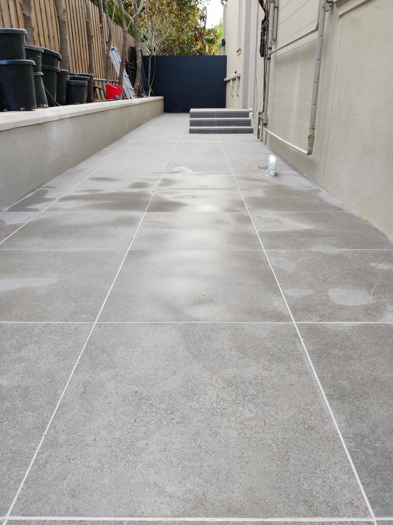 New paved pathway installed alongside the home
